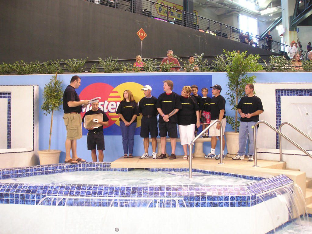 Team Standing with the original diamond back swimming pool before remodel