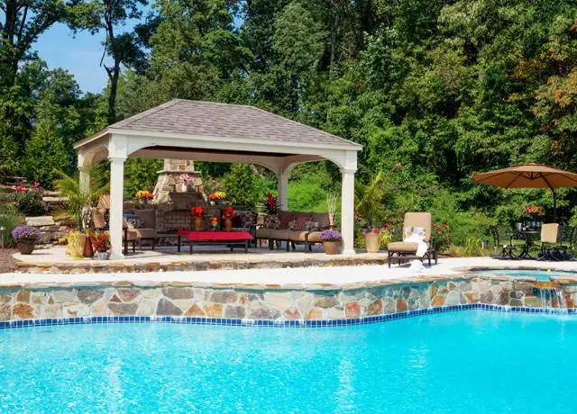 Custom vinyl pavilion with stone work swimming pool in arizona