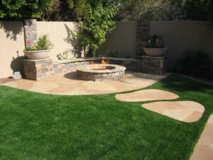 Stone fire pit with flagstone walking steps