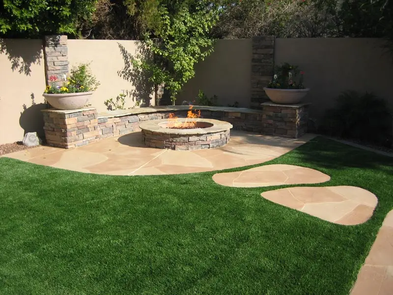 Stone fire pit with flagstone walking steps