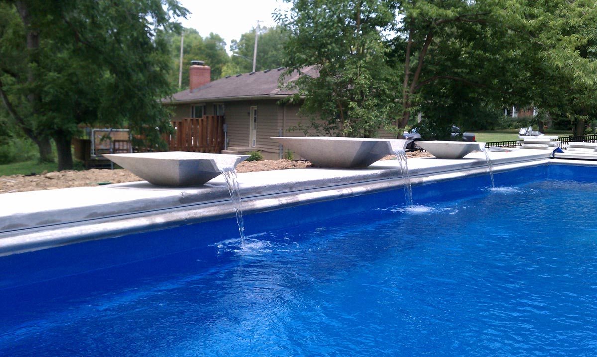 Custom swimming pool services for water feature bowl in swimming pool