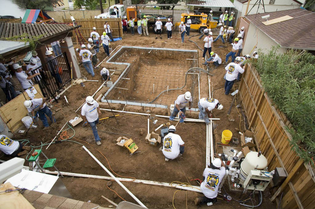 setting up pipe lines for swimming pool system