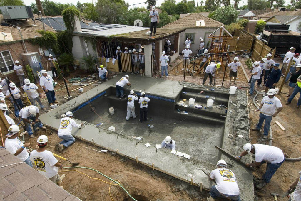 smoothing concrete for swimming pool patio