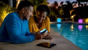 Couple discussing pool lighting options