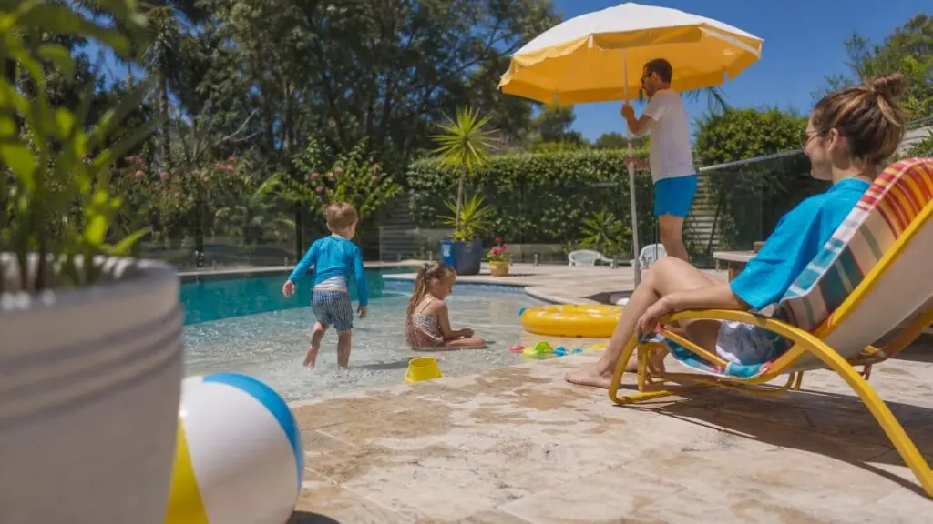 Family enjoying kid-friendly pool with safety features