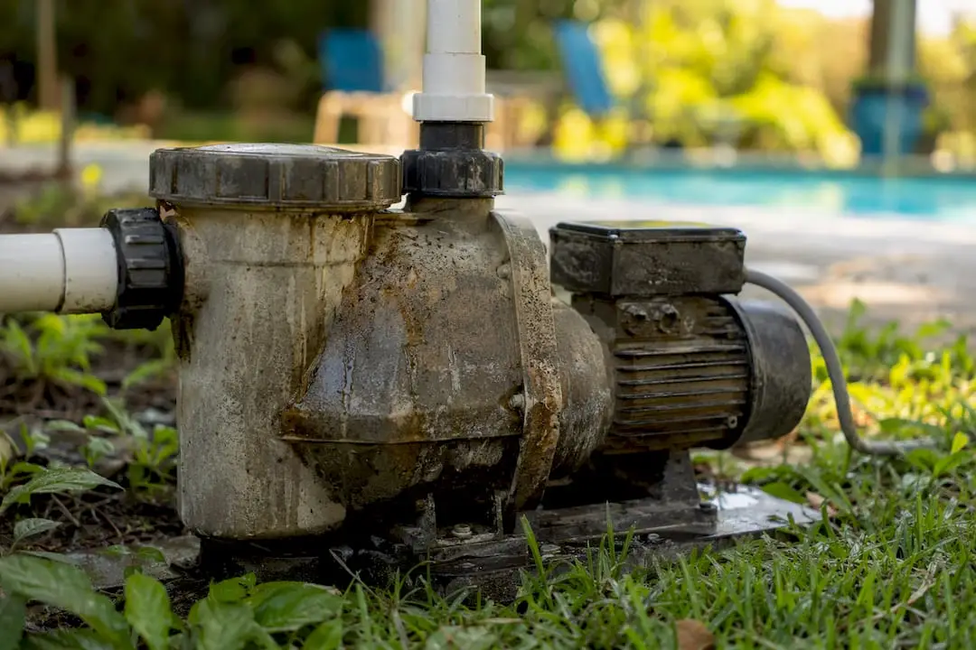 Worn residential pool pump motor close-up