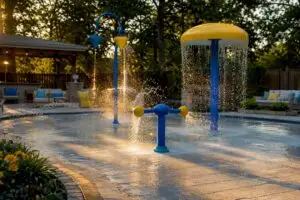 Commercial backyard splash pad spraying water