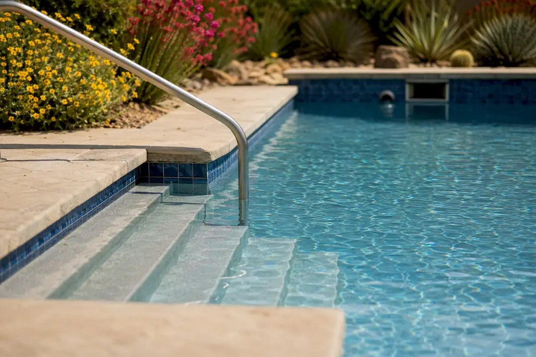 Pool steps placed safely away from return jet and skimmer