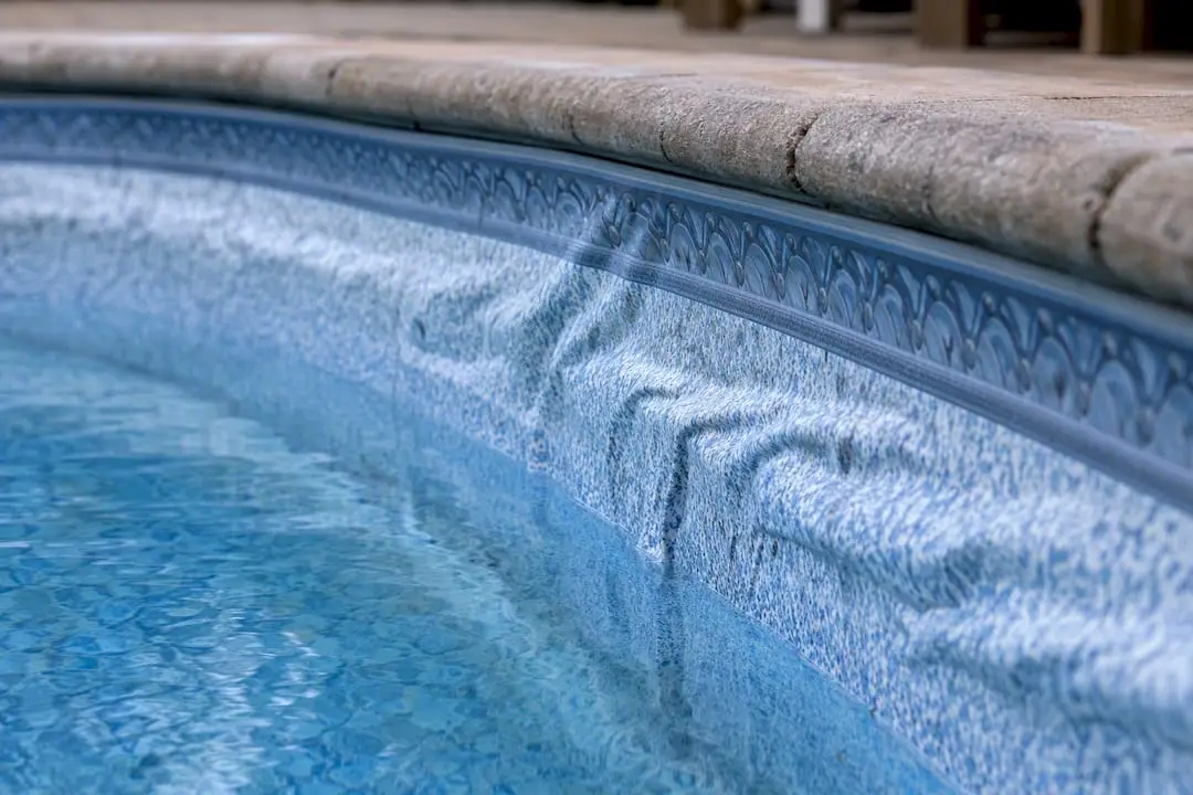 Vinyl pool liner damaged by improper drainage