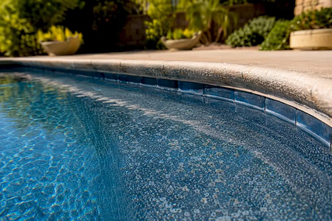 Close-up of textured pool plaster surface