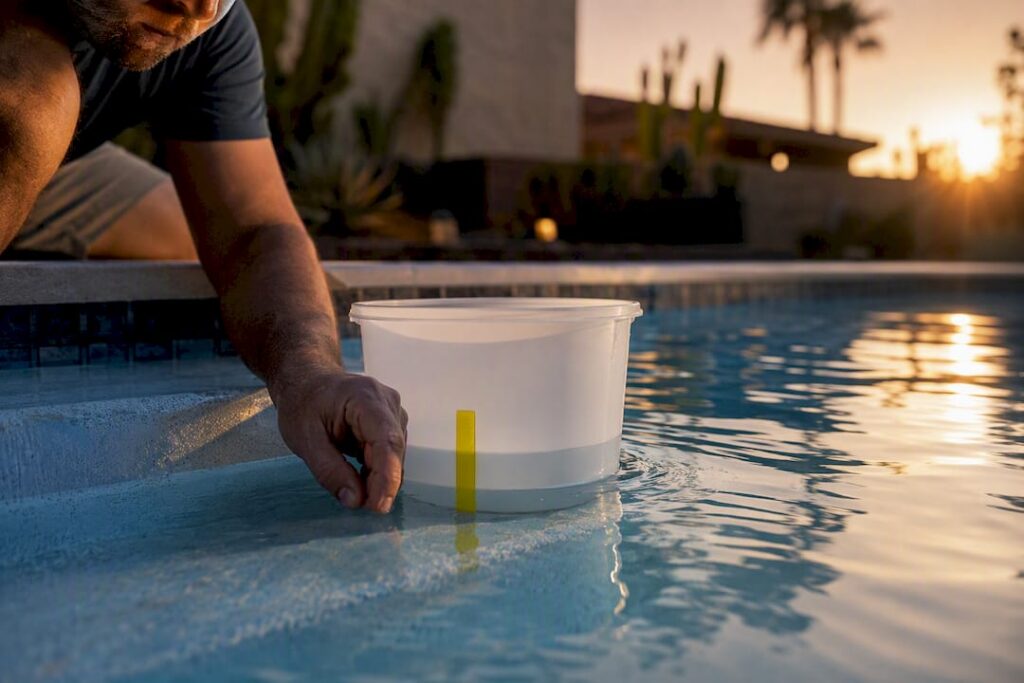 Bucket test beside a pool waterline