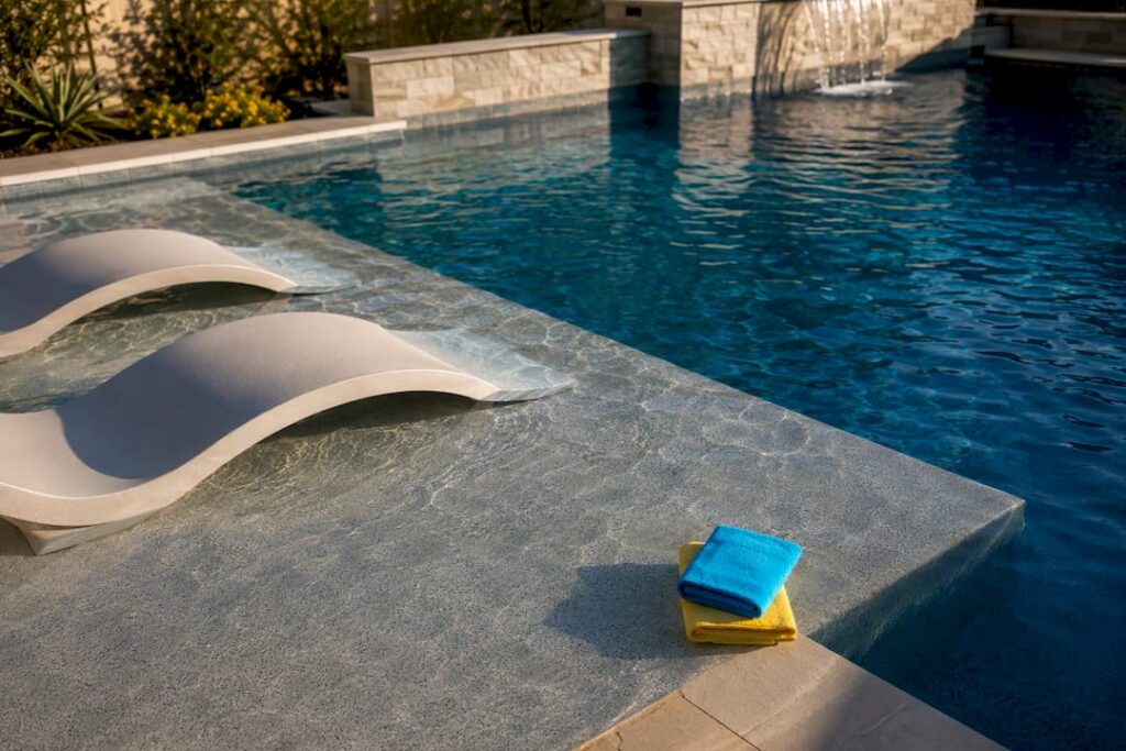 Baja shelf with loungers in pool